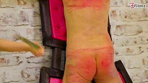 take that whip on your ass slaves as we spank you harder together