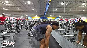 athletic dreadlocked bodybuilder crushes fullbody tattooed workout routine hard