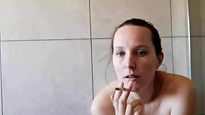 cute skinny neighbor smokes solo in homemade bathroom fetish clip