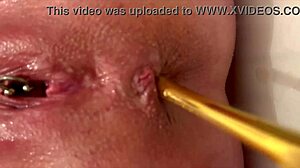 hey, check out this milf slipping gold heels into her ass while fingering that juicy hole