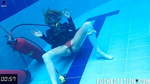 you won't believe how this horny ashlee rose slut grinds her small tits in scuba dress underwater