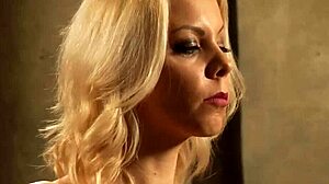 bound busty lesbian slave rubs her big tits in bondage