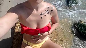 Hot Tattooed Blonde Fingers Pussy Intensely On Public Beach