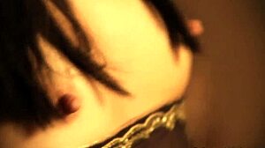 brunette milf poses sexy in her tight black dress