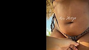 married prostitute shows off huge tanned ass with bikini wedged deep in cheeks