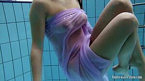 whoa aneta's big tits look epic in that purple dress underwater pool play