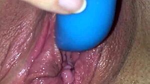 mature woman masturbates intensely with vibrating toy up close