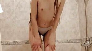 skinny teen brunette pisses through panties into bath squeezes for mouth