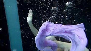 whoa aneta's big tits look epic in that purple dress underwater pool play