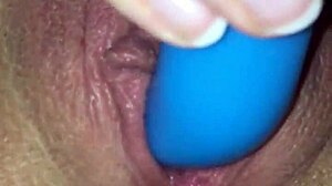 mature woman masturbates intensely with vibrating toy up close