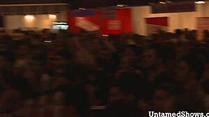 naughty brunette dances teasingly ripping clothes off her body