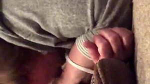 Step mom kneels sucking cock while fingering her dripping pussy