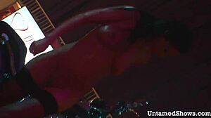 naughty brunette dances teasingly ripping clothes off her body