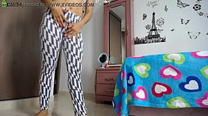 fitness model with big ass does squats in tight leggings showing off her athletic legs and natural tits