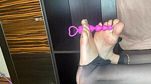 whoa, check this closeup foot in black stockings teasing anal bed play 😈👣