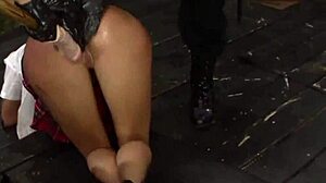 cuffed tattooed les mistress dominates with strapon ride fingering bondage