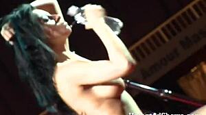 naughty brunette dances teasingly ripping clothes off her body