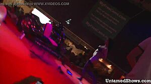 naughty brunette dances teasingly ripping clothes off her body