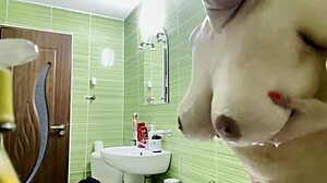 feeling so naughty soaping my big tattooed tits in steamy shower alone