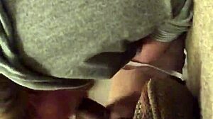 Step mom kneels sucking cock while fingering her dripping pussy