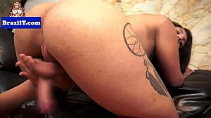 the latina tranny biiahh strokes her hard cock then drops to suck it deep