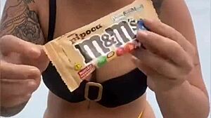 Young african usa girl in tight yellow bikini splitting swollen pussy on beach