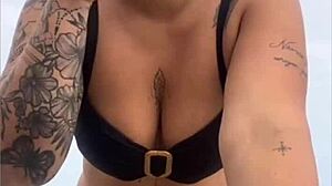 Young african usa girl in tight yellow bikini splitting swollen pussy on beach