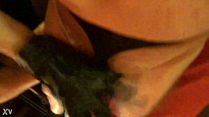 Lady J Grips Tight in Edgy Vampire Gloves