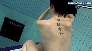 flashing my bright tits underwater at the beach has everyone staring horny