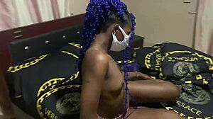 Gorgeous black babe fingers her horny pussy wildly!