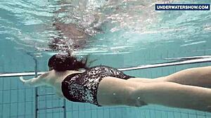 flashing my bright tits underwater at the beach has everyone staring horny