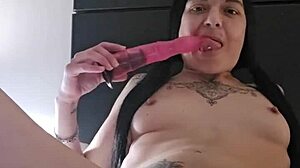 Emy Angel gropes and rubs hard on her naughty toy!