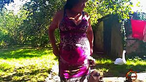 KLAUDIAAMBERGIRL STRIPS TITS OUTDOOR IN STOCKINGS!