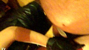 Lady J Grips Tight in Edgy Vampire Gloves