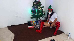 Mature student unwraps christmas dildo and rubs her clit in homemade spotlight video