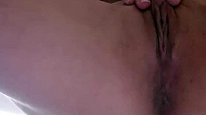 Emy Angel gropes and rubs hard on her naughty toy!