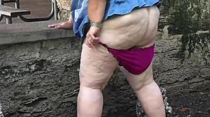 big fat mature bbw granny flashes huge juicy ass pussy squirting peeing close up public park