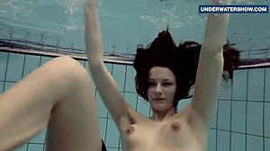 flashing my bright tits underwater at the beach has everyone staring horny