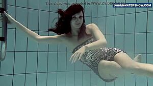 flashing my bright tits underwater at the beach has everyone staring horny