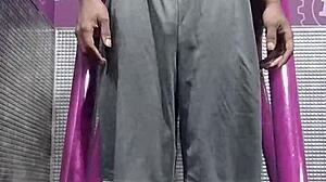 athletic brunette uses gym machine for intense solo workout