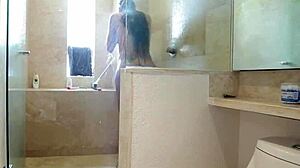glamorous latina shemale strokes her hard cock in steamy shower tease