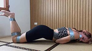 damn this redhead's cute feet while she's duct taped and moaning in pov