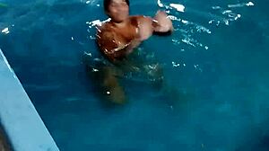 scorching day has redhead da belan stripping nude by the pool