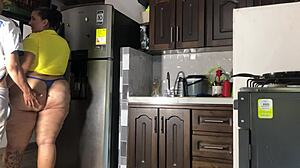 Argentino pounds colombiana roughly in kitchen