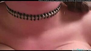 pigtailed brunette squeezes and bounces her huge natural tits solo