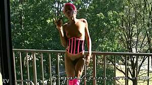 miss fifi in corset stockings lights up skinny ebony cigarette tease