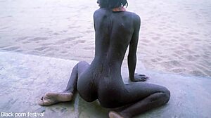 Skinny ebony dances naked rain but craves more touch?