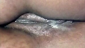 up close on this smooth african shaved pussy eating