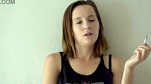 this cute blue-eyed brunette babe smokes teasing her petite voyeur curves slowly