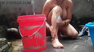 i watch my indian milf wife bathe outdoors showing big tits and pussy